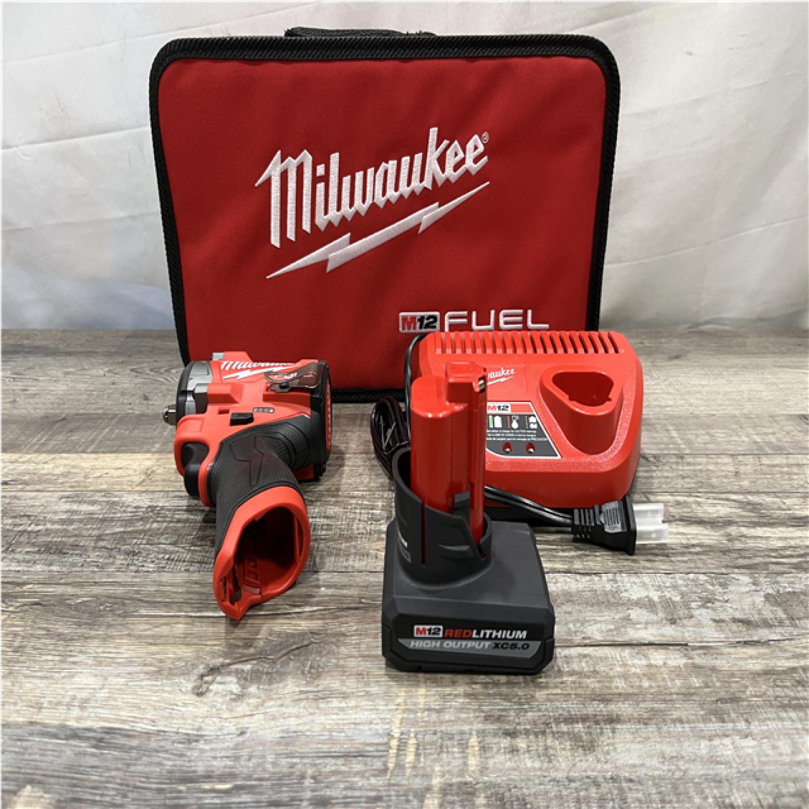 AS-IS Milwaukee FUEL 12V Li-Ion Brushless Cordless Stubby 3/8 in. Impact Wrench Kit