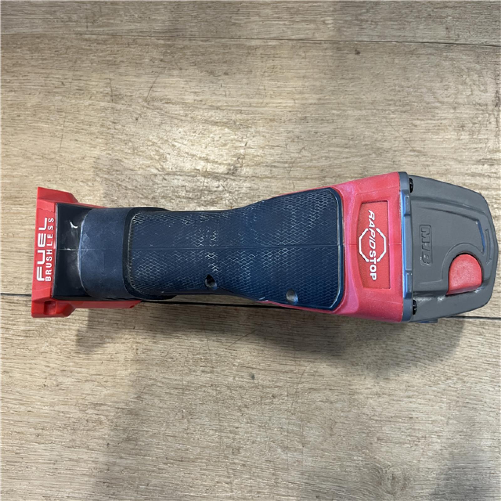 AS-IS Milwaukee FUEL 18V Lithium-Ion Brushless Cordless 4-1/2 in./5 in. Grinder w/Paddle Switch (Tool-Only)