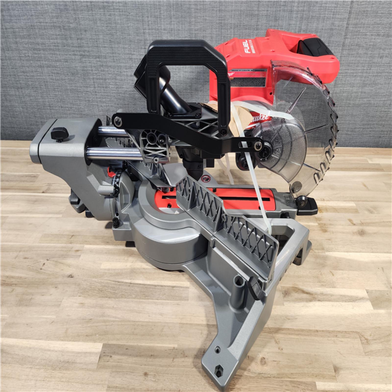 HOUSTON LOCATION - AS-IS (APPEARS LIKE NEW) Milwaukee M18 FUEL Brushless Cordless 7-1/4 in. Dual Bevel Sliding Compound Miter Saw (Tool-Only)