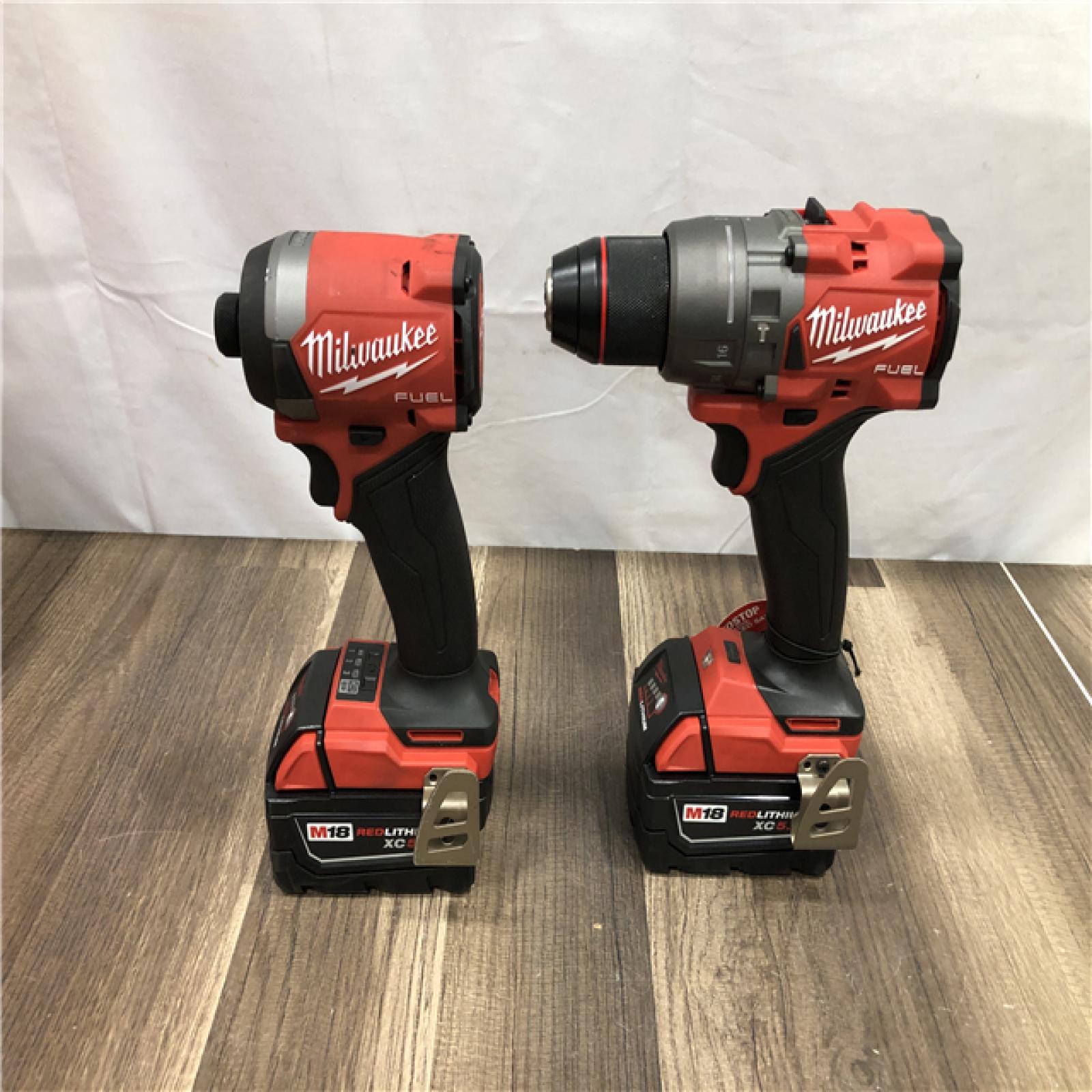 AS-IS Milwaukee  FUEL 18V Lithium-Ion Brushless Cordless Hammer Drill and Impact Driver Combo Kit