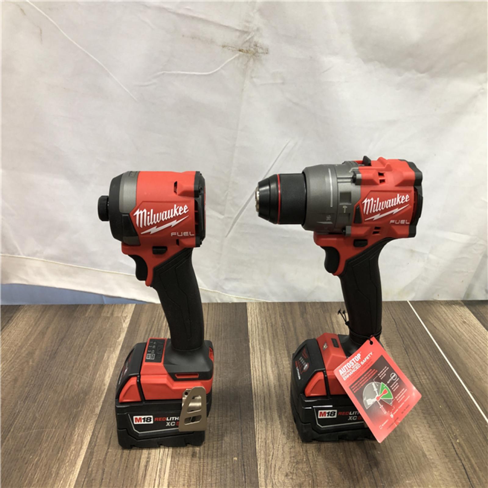 AS-IS Milwaukee FUEL 18V Lithium-Ion Brushless Cordless Hammer Drill and Impact Driver Combo Kit