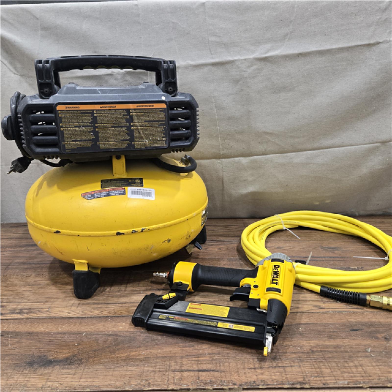 AS-IS DEWALT 6 Gal. 18-Gauge Brad Nailer and Heavy-Duty Pancake Electric Air Compressor Combo Kit