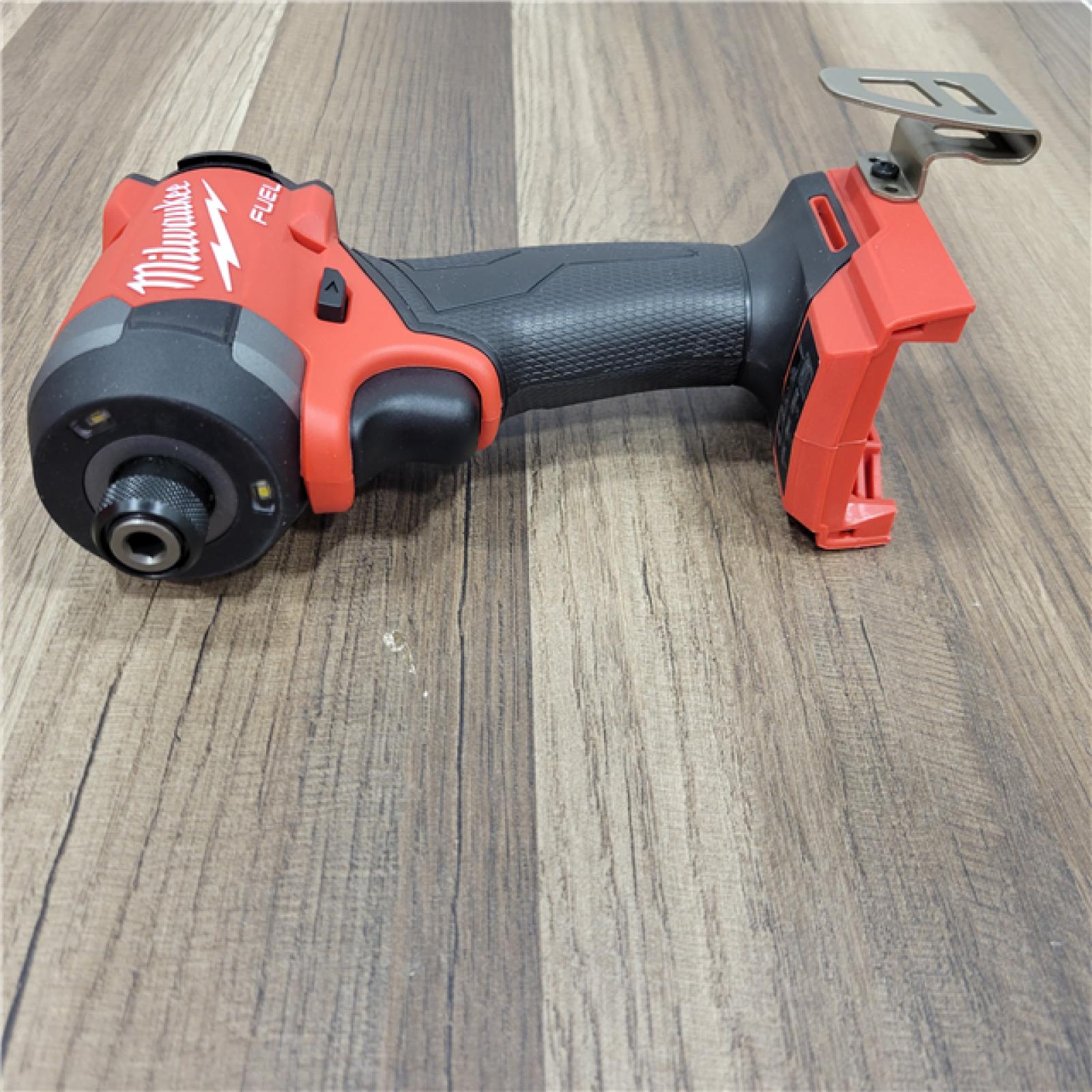 AS-IS Milwaukee 2953-20 18V Lithium-Ion Brushless Cordless 1/4   Hex Impact Driver Bare Tool  Red