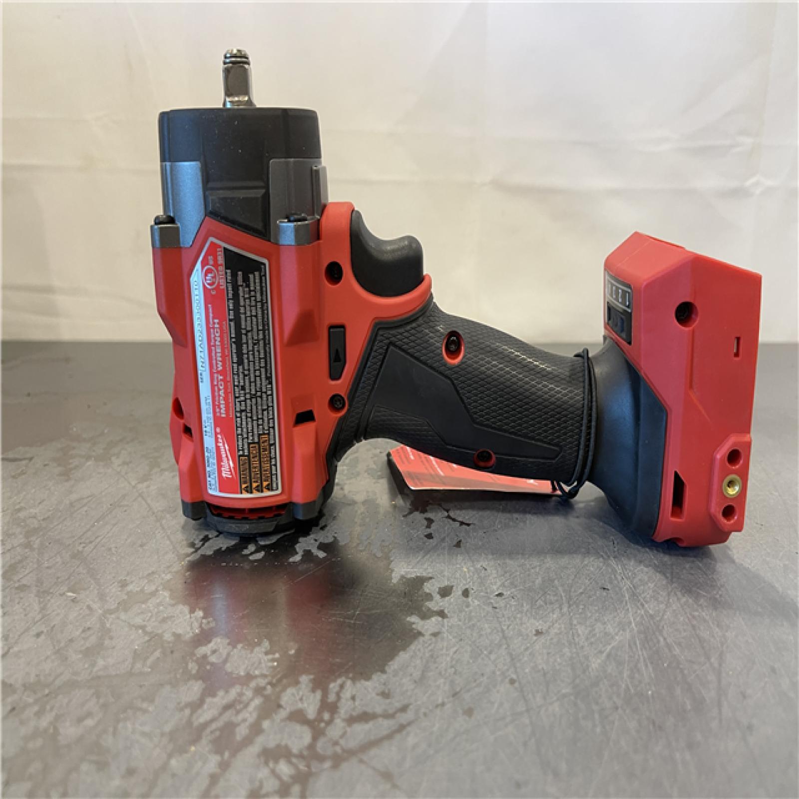 AS-IS - Milwaukee M18 FUEL 18V Lithium-Ion Brushless Cordless 3/8 in. Controlled Torque Compact Impact Wrench W/TORQUE-SENSE