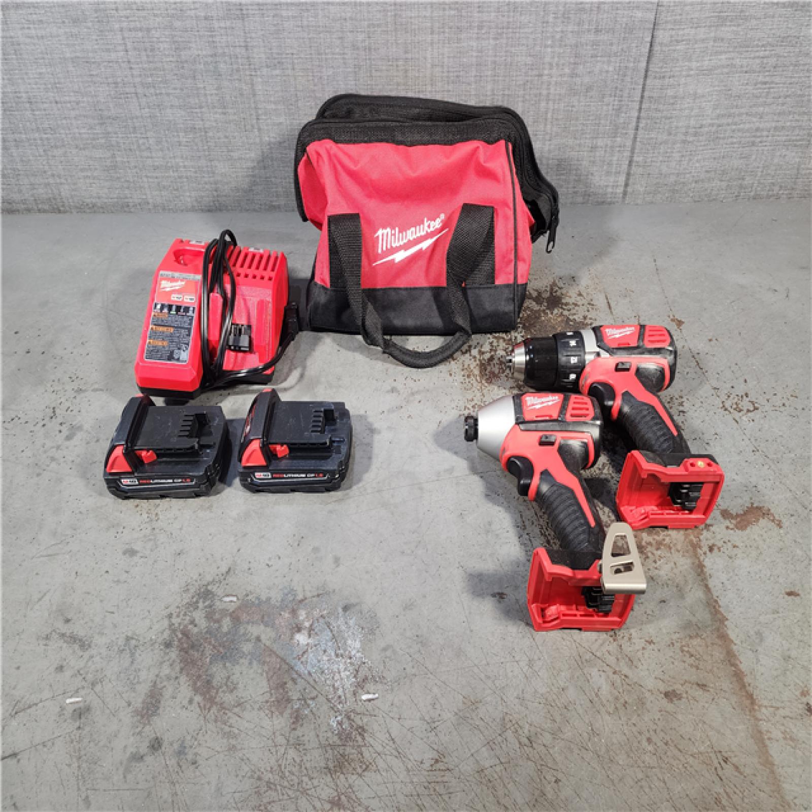 HOUSTON LOCATION - AS-IS Milwaukee M18 18V Cordless Brushed 2 Tool Drill/Driver and Impact Driver Kit
