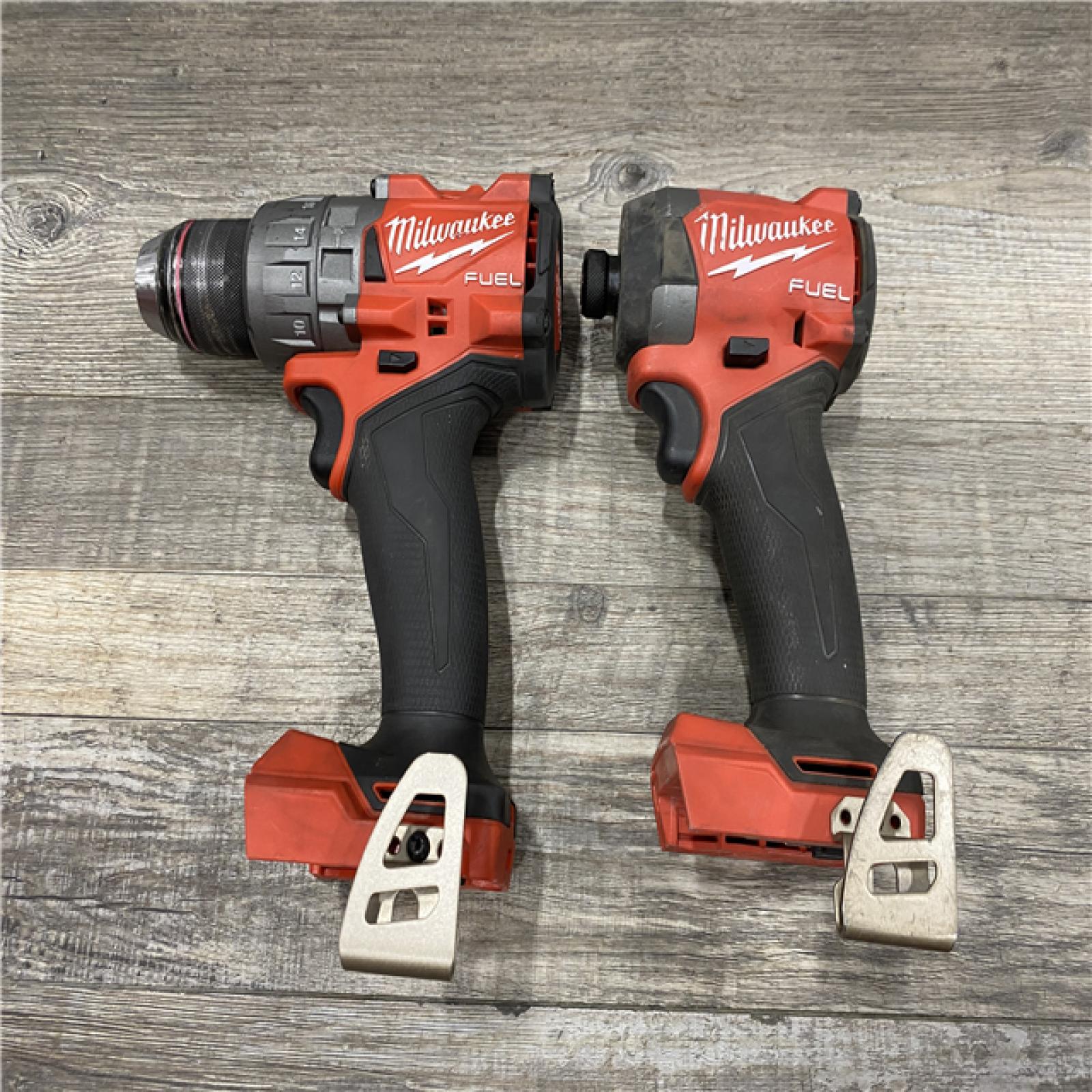 AS-IS Milwaukee FUEL 18V Lithium-Ion Brushless Cordless Hammer Drill and Impact Driver Combo Kit