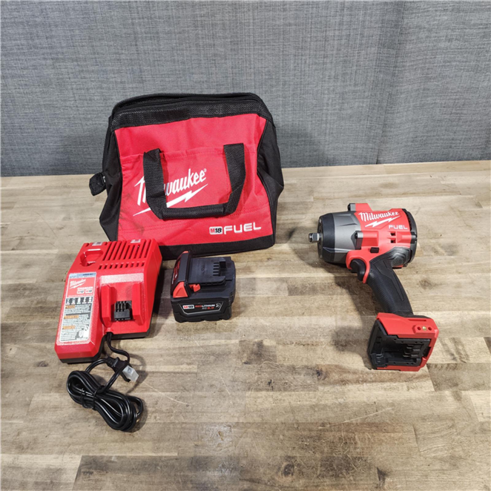 HOUSTON LOCATION - AS-IS (APPEARS LIKE NEW) Milwaukee M18 1/2 in. Cordless Brushless High Torque Impact Wrench Kit (Battery & Charger)