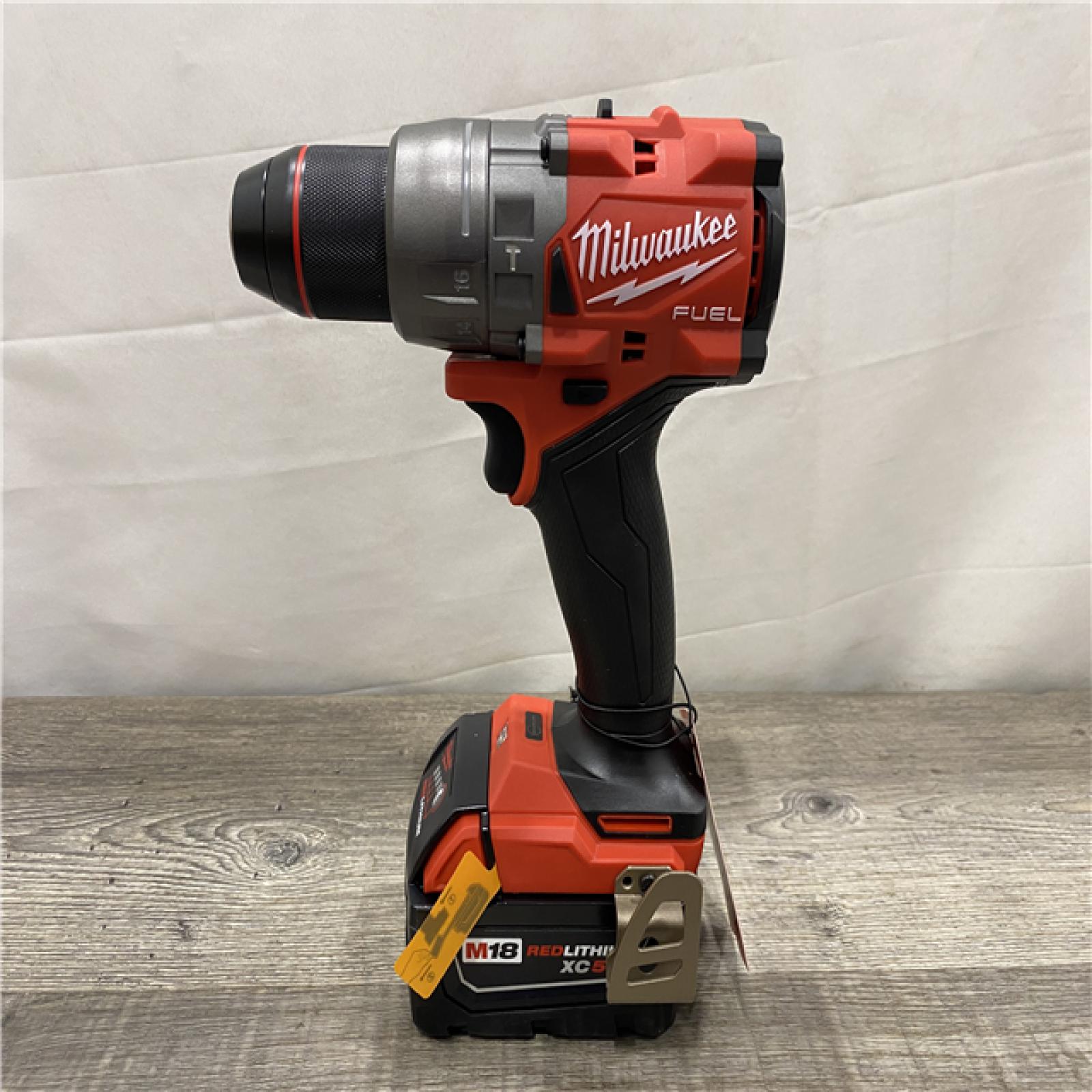 AS-IS Milwaukee FUEL 18V Lithium-Ion Brushless Cordless 1/2 in. Hammer Drill Driver Kit