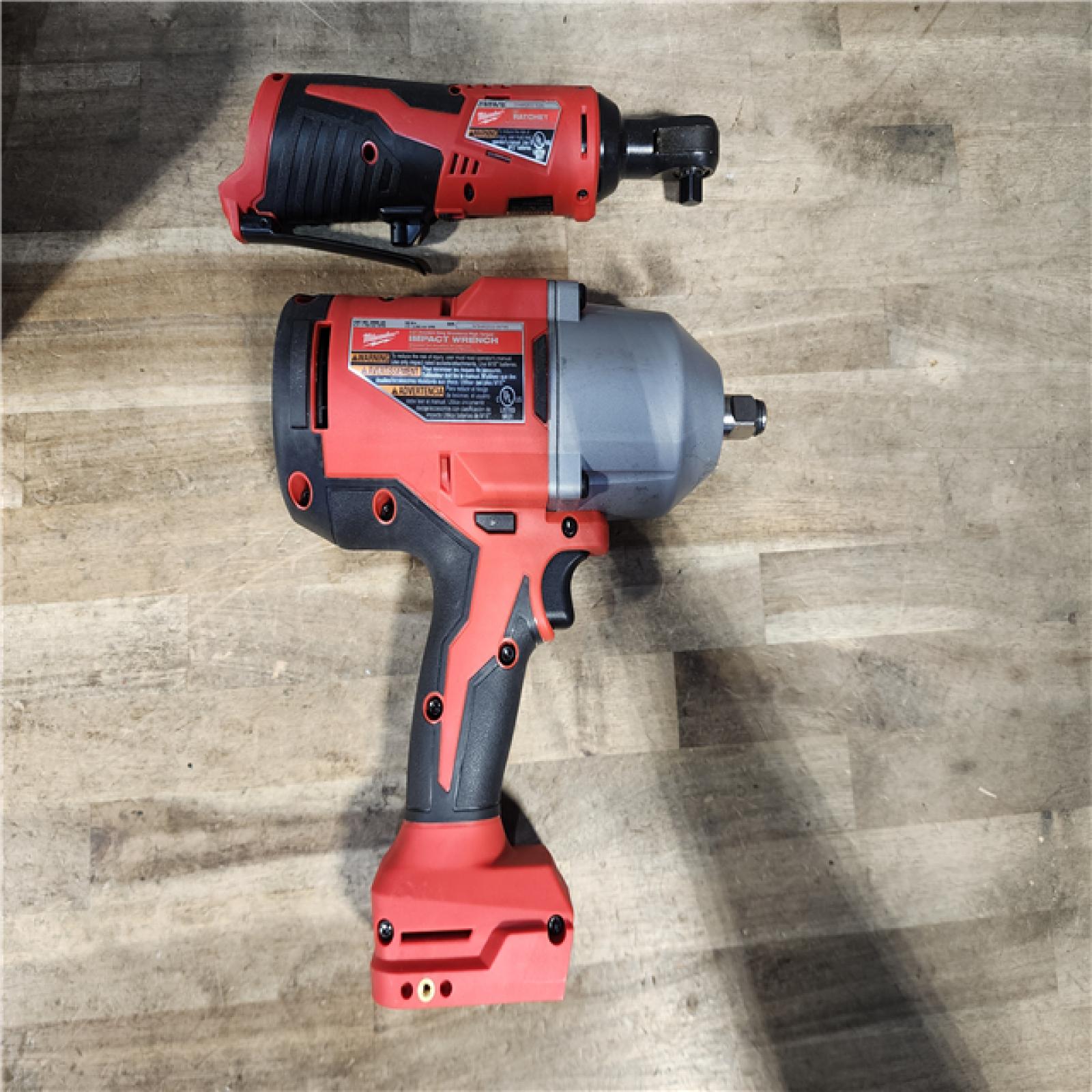 HOUSTON LOCATION - AS-IS Milwaukee 12/18V Lithium-Ion Cordless 3/8 in. Ratchet and 1/2 in. High Torque Impact Wrench with Friction Ring Combo Kit