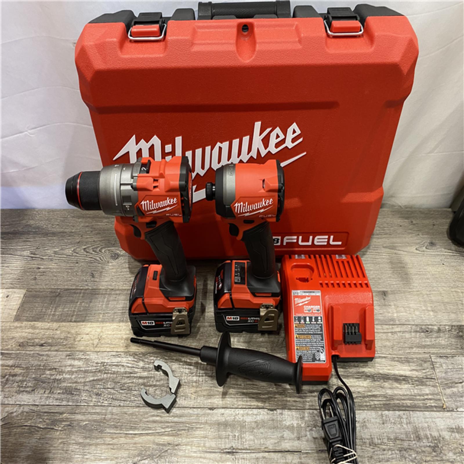 AS-IS Milwaukee FUEL 18V Lithium-Ion Brushless Cordless Hammer Drill and Impact Driver Combo Kit