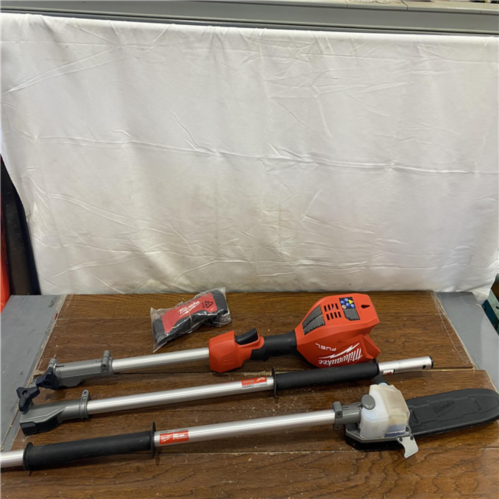 AS-IS M18 FUEL 18V 10 in. Brushless Cordless Battery Powered Pole Saw with QUIK-LOK Attachment Capability (Tool-Only)