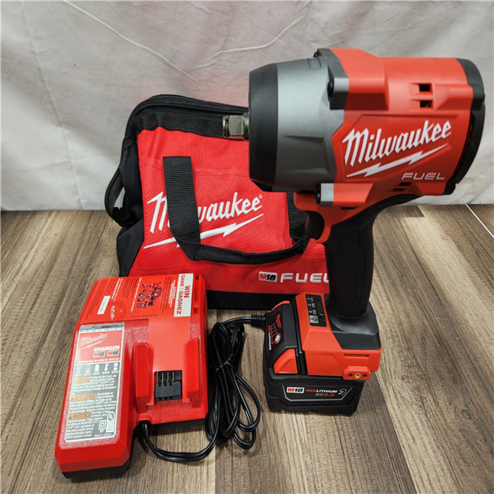 AS-IS- Milwaukee M18 1/2 in. Cordless Brushless High Torque Impact Wrench Kit (Battery & Charger)