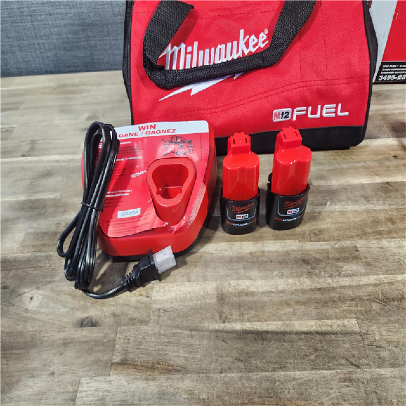 HOUSTON LOCATION - AS-IS M12 FUEL 12-Volt Li-Ion Brushless Cordless Hammer Drill Combo Kit, Reciprocating Saw, Flood Light W/2 Batteries (3-Tool)