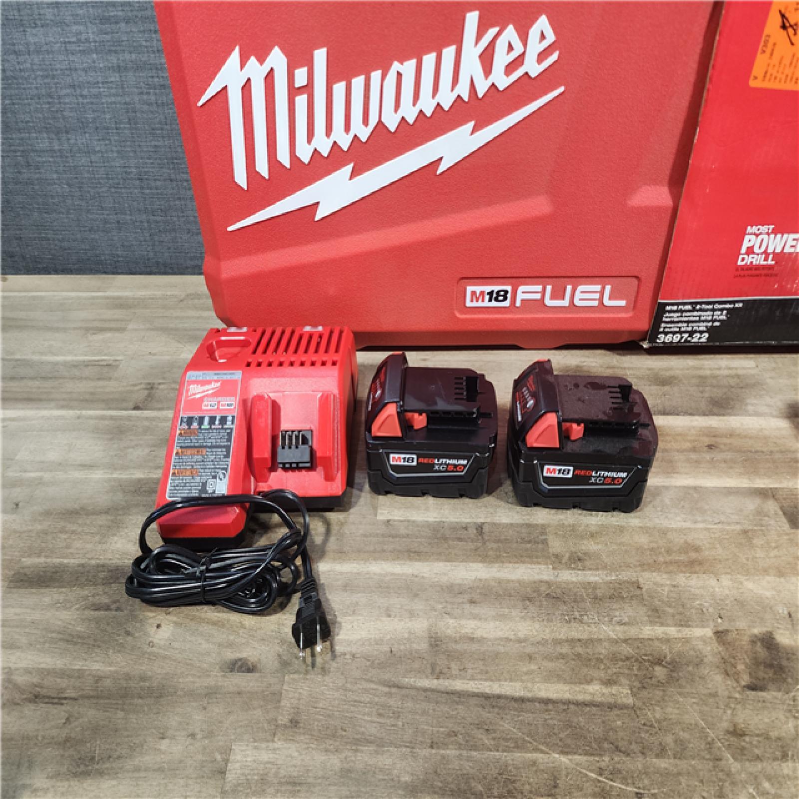 HOUSTON LOCATION - AS-IS (APPEARS LIKE NEW) MILWAUKEE FUEL 18V Lithium-Ion Brushless Cordless Hammer Drill and Impact Driver Combo Kit (2-Tool) with 2 Batteries