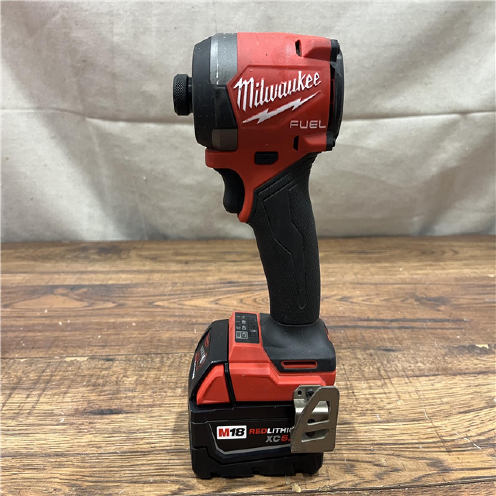 AS-IS MILWAUKEE M18 FUEL 18V Lithium-Ion Brushless Cordless Hammer Drill and Impact Driver Combo Kit (2-Tool) with 2 Batteries