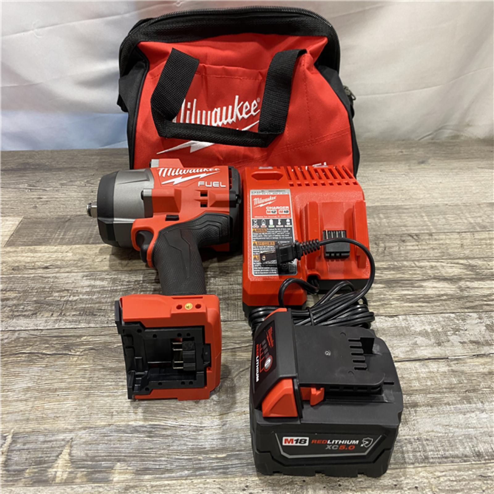 AS-IS Milwaukee FUEL 18V Lithium-Ion Brushless Cordless 1/2 in. Impact Wrench w/Friction Ring Kit