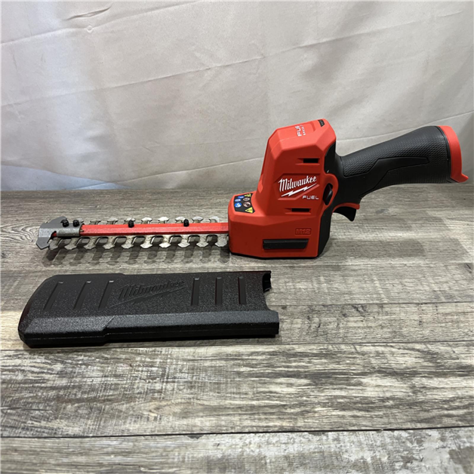 AS-IS Milwaukee FUEL 8 in. 12V Lithium-Ion Brushless Cordless Battery Hedge Trimmer (Tool-Only)