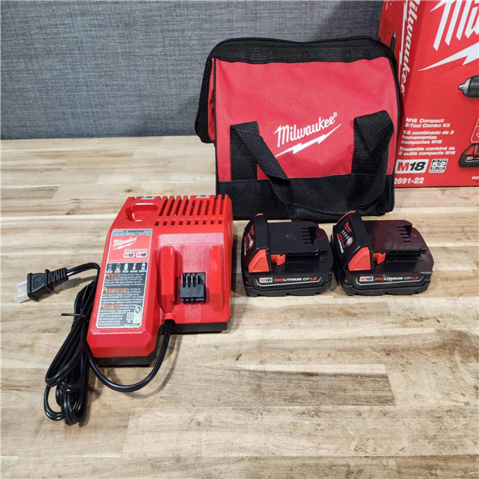 HOUSTON LOCATION - AS-IS Milwaukee M18 18V Lithium-Ion Cordless Drill Driver/Impact Driver Combo Kit
