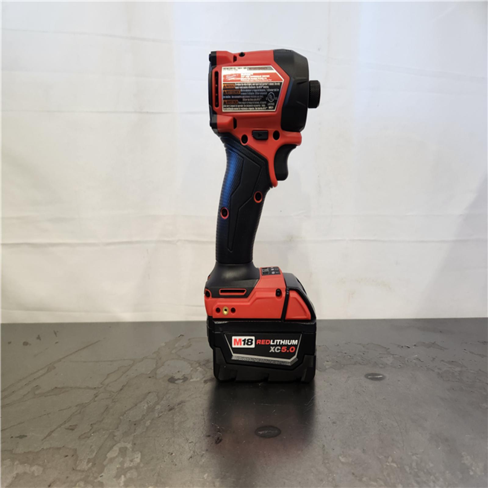 AS-IS- Milwaukee FUEL SURGE 18V Lithium-Ion Brushless Cordless 1/4 in. Hex Impact Driver with (2) 5.0 Ah Battery and Charger