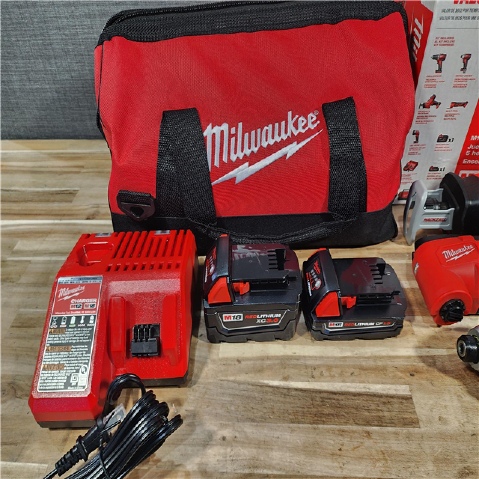HOUSTON LOCATION - AS-IS (APPEARS LIKE NEW) M18 18V Lithium-Ion Cordless Combo Kit (5-Tool) with (2) Batteries  Charger and Tool Bag