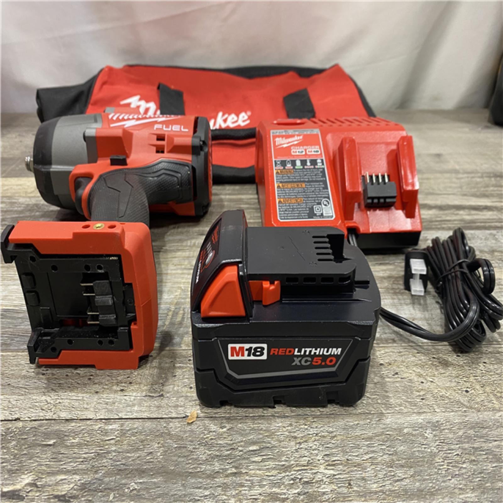 AS-IS Milwaukee FUEL 18V Lithium-Ion Brushless Cordless 1/2 in. Impact Wrench w/Friction Ring Kit