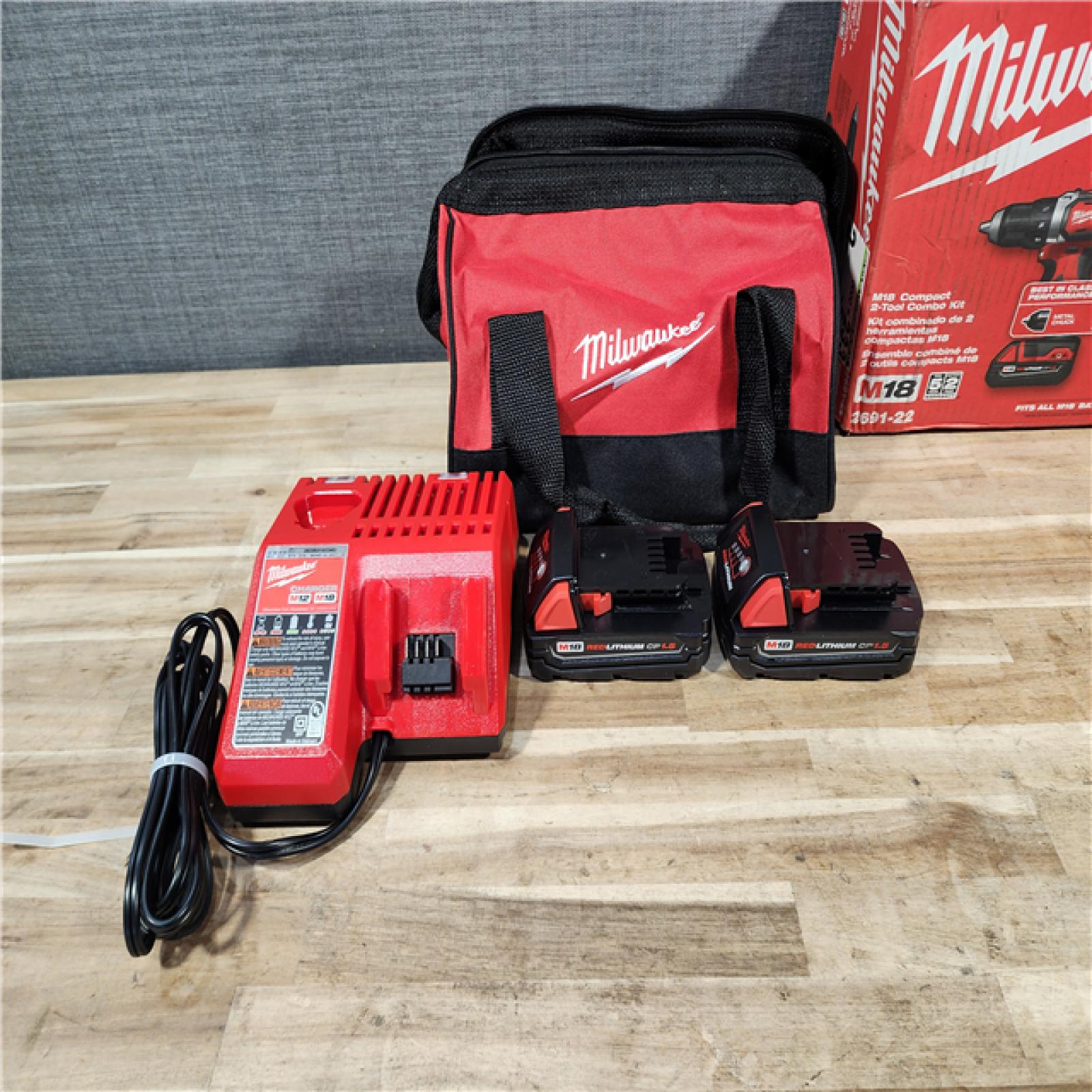 HOUSTON LOCATION - AS-IS Milwaukee M18 18V Lithium-Ion Cordless Drill Driver/Impact Driver Combo Kit