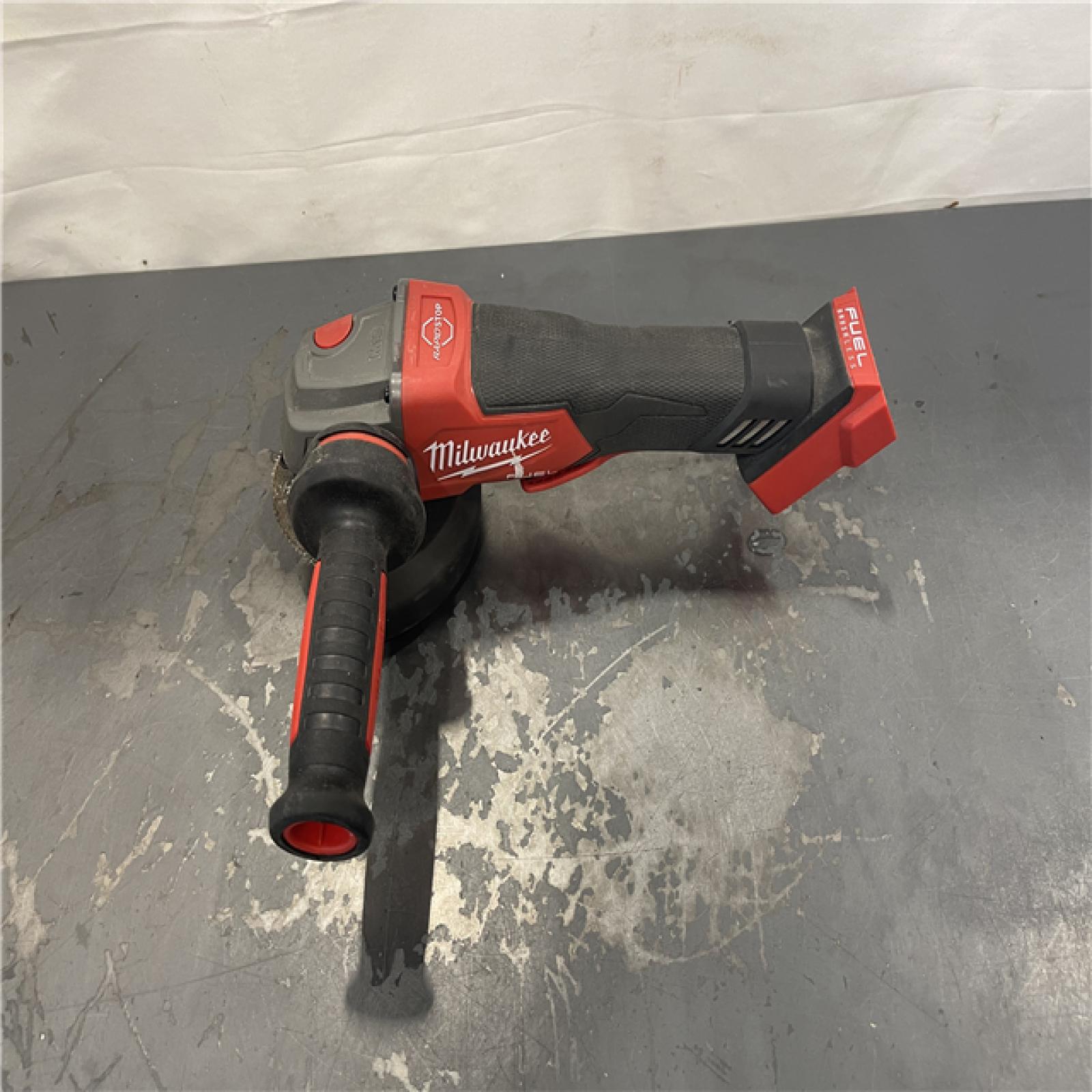 AS-IS- Milwaukee FUEL 18-Volt Lithium-Ion Brushless Cordless 4-1/2 in./5 in. Grinder W/Paddle Switch (Tool-Only)