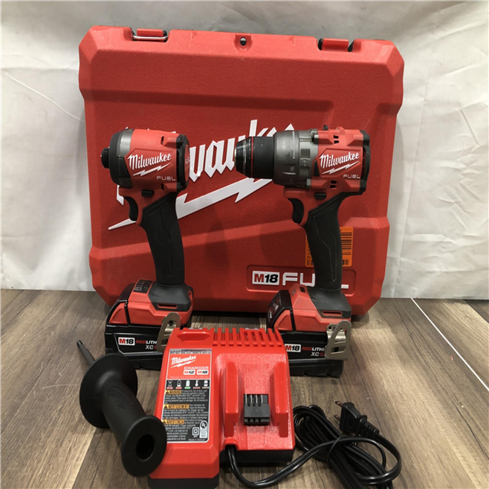 AS-IS Milwaukee FUEL 18V Lithium-Ion Brushless Cordless Hammer Drill and Impact Driver Combo Kit