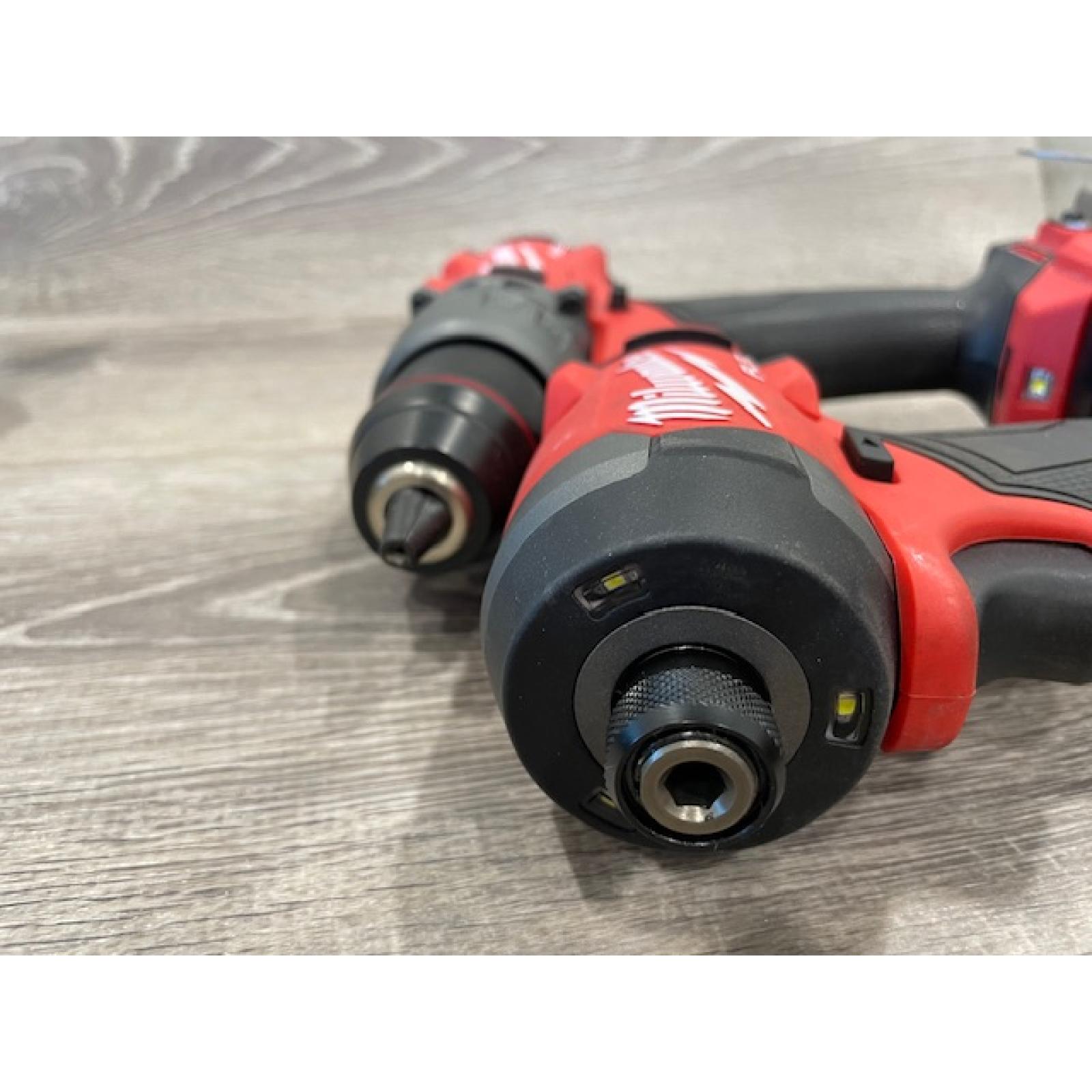AS-IS Milwaukee FUEL 18V Lithium-Ion Brushless Cordless Hammer Drill and Impact Driver Combo Kit