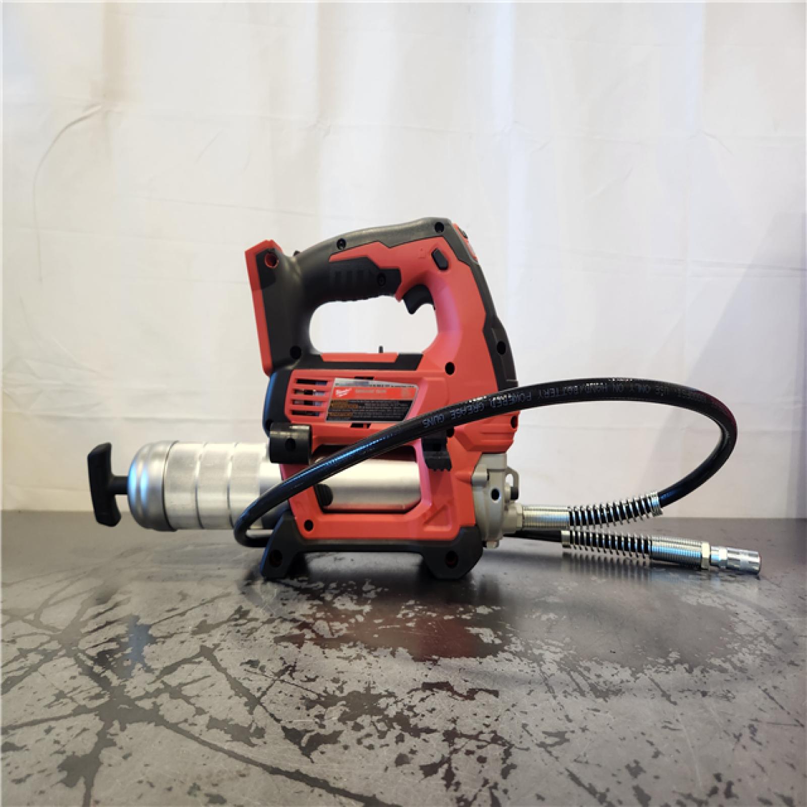 AS-IS- Milwaukee M18 18-Volt Lithium-Ion Cordless Grease Gun 2-Speed (Tool-Only)