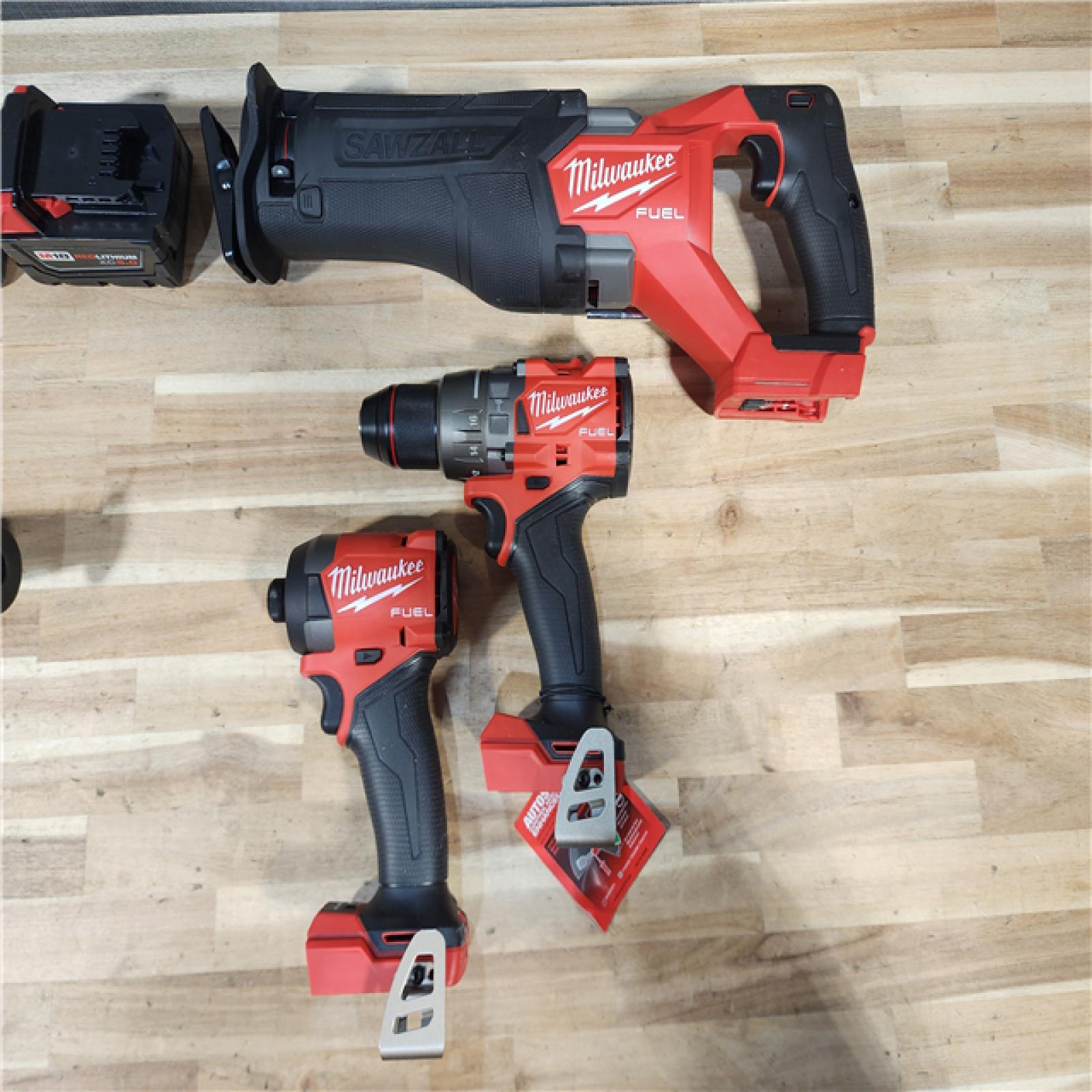 HOUSTON LOCATION - AS-IS M18 FUEL 18V Lithium-Ion Brushless Cordless Combo Kit (3-Tool) with Two 5.0 Ah Batteries  1 Charger 1 Tool Bag