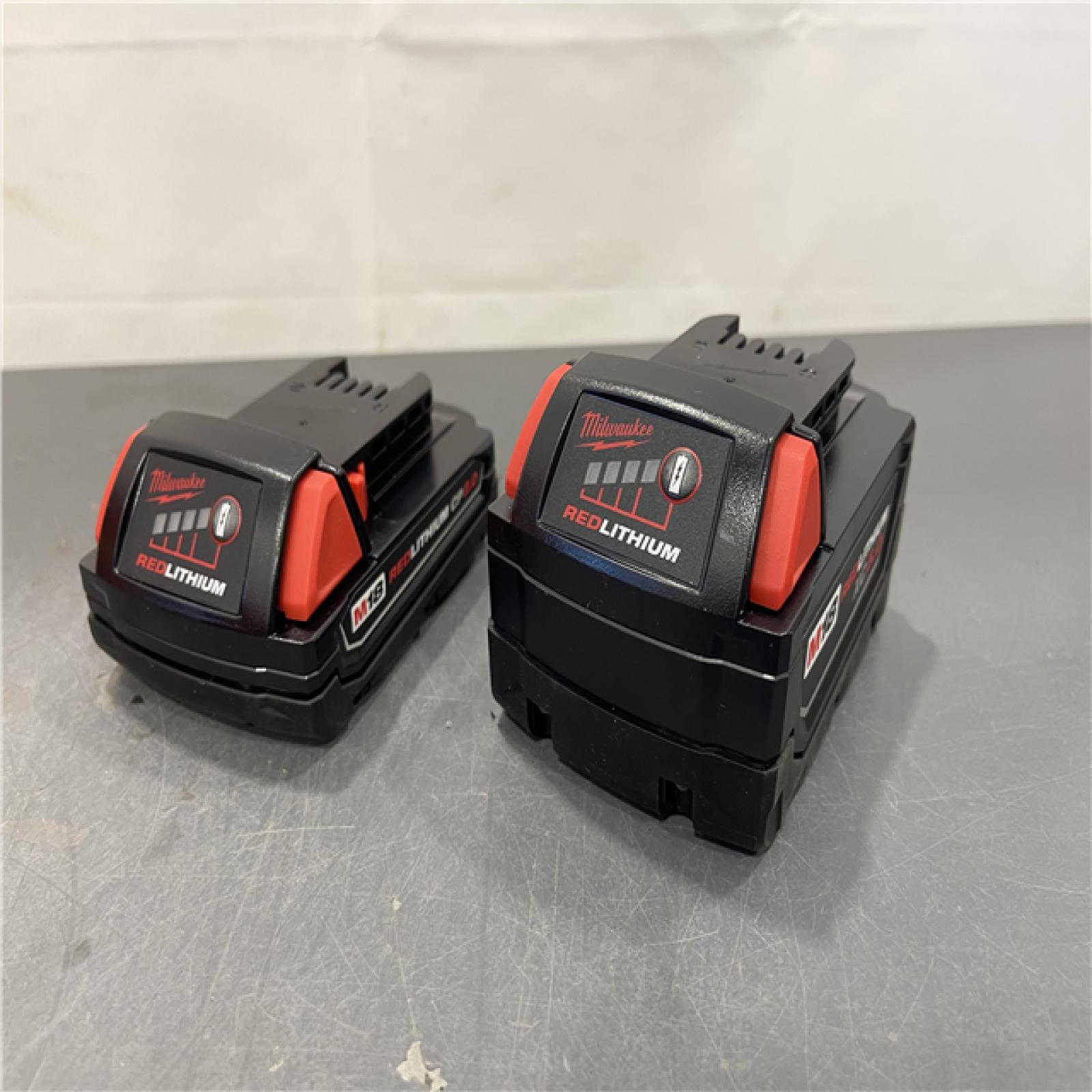 AS-IS - Milwaukee M18 18-Volt Lithium-Ion Starter Kit with One 5.0 Ah and One 2.0 Ah Battery and Charger
