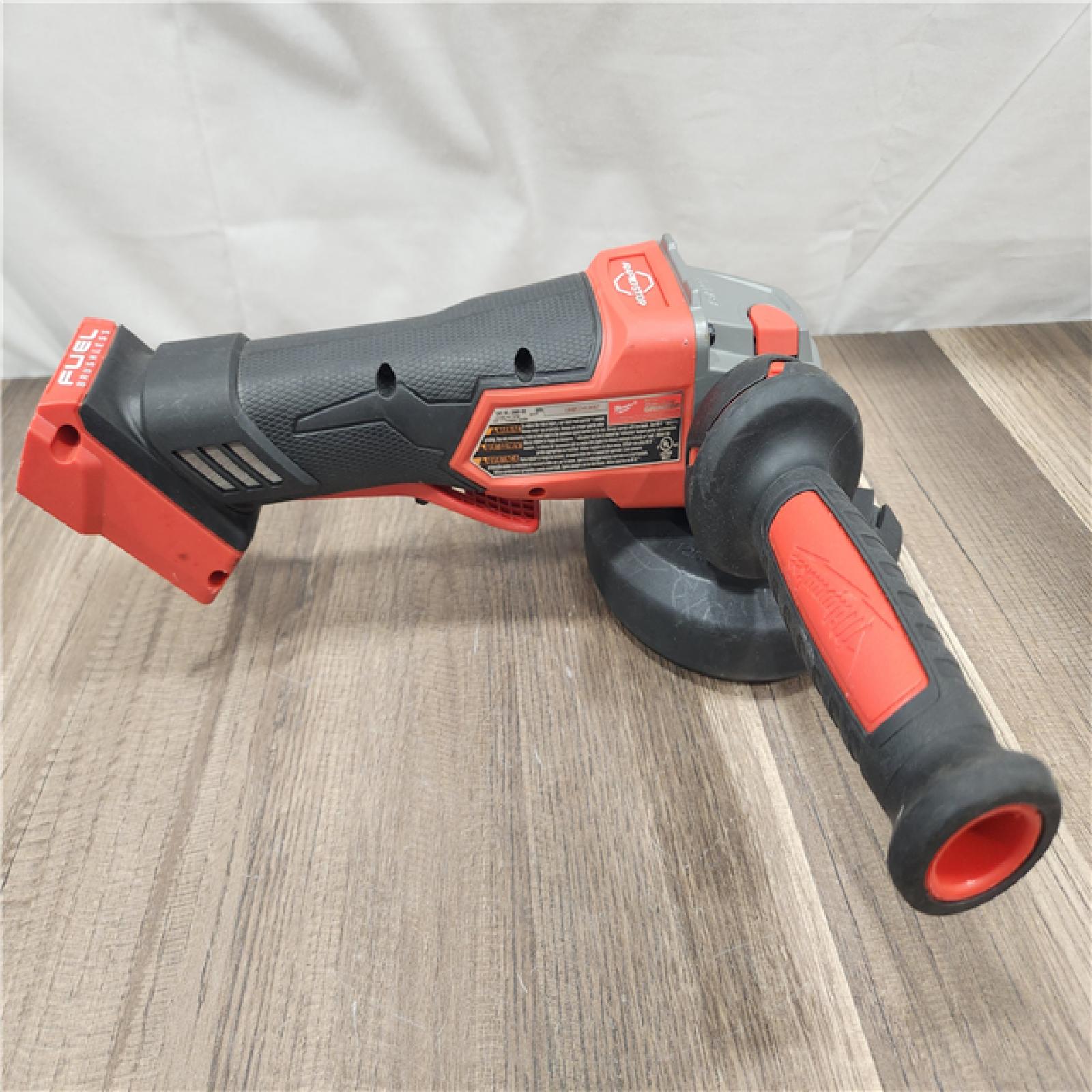 AS-IS- Milwaukee FUEL 18-Volt Lithium-Ion Brushless Cordless 4-1/2 in./5 in. Grinder W/Paddle Switch (Tool-Only)