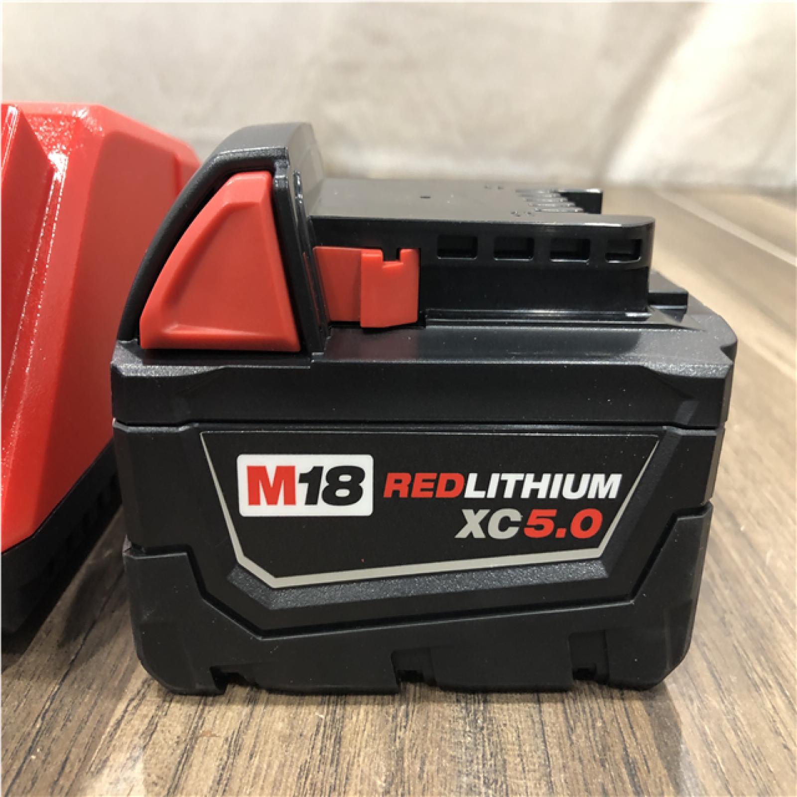 AS-IS Milwaukee 18-Volt Lithium-Ion XC Starter Kit with One 5.0Ah Battery and Charger