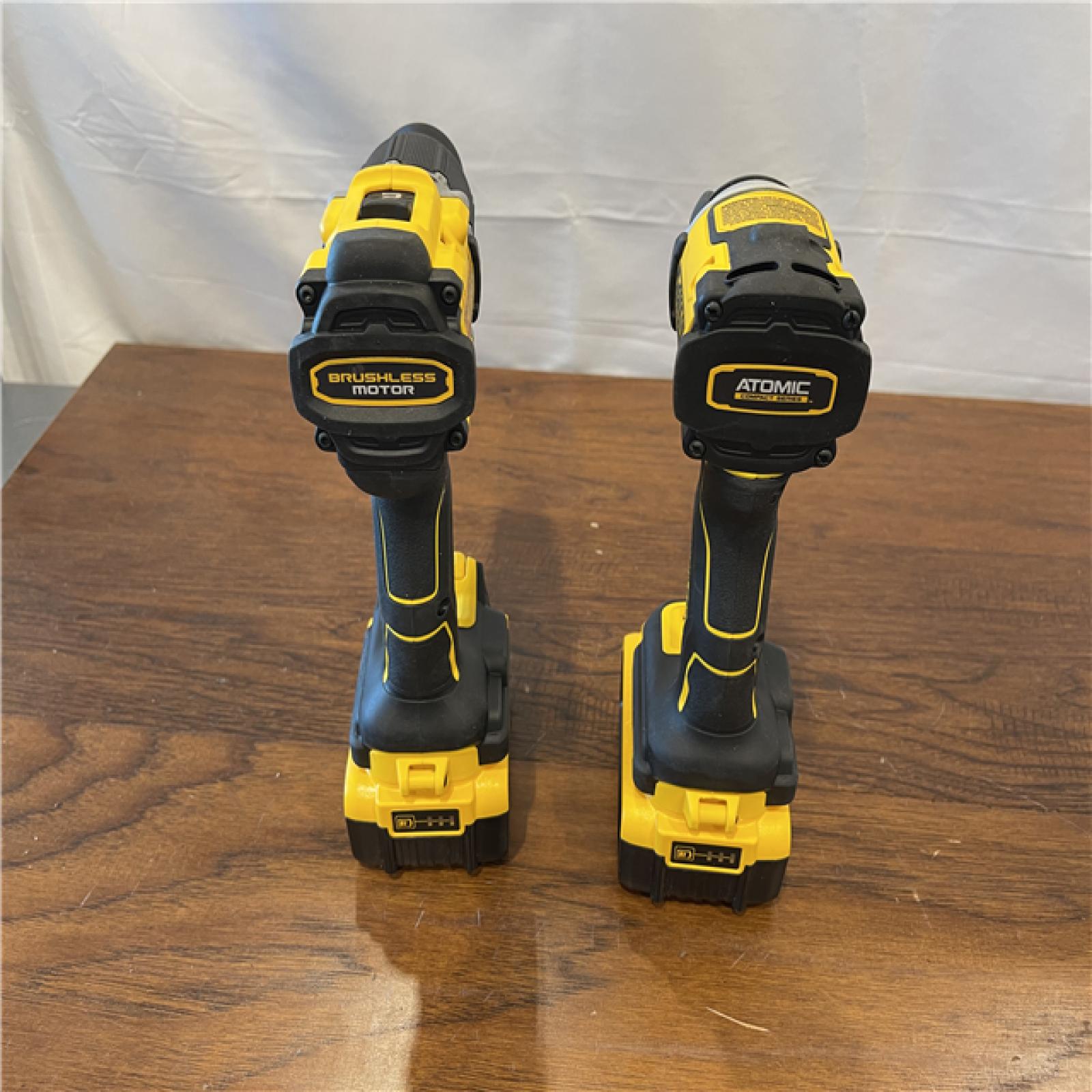 AS-IS - DEWALT 20V MAX XR Hammer Drill and ATOMIC Impact Driver 2 Tool Cordless Combo Kit with (2) 4.0Ah Batteries, Charger, and Bag