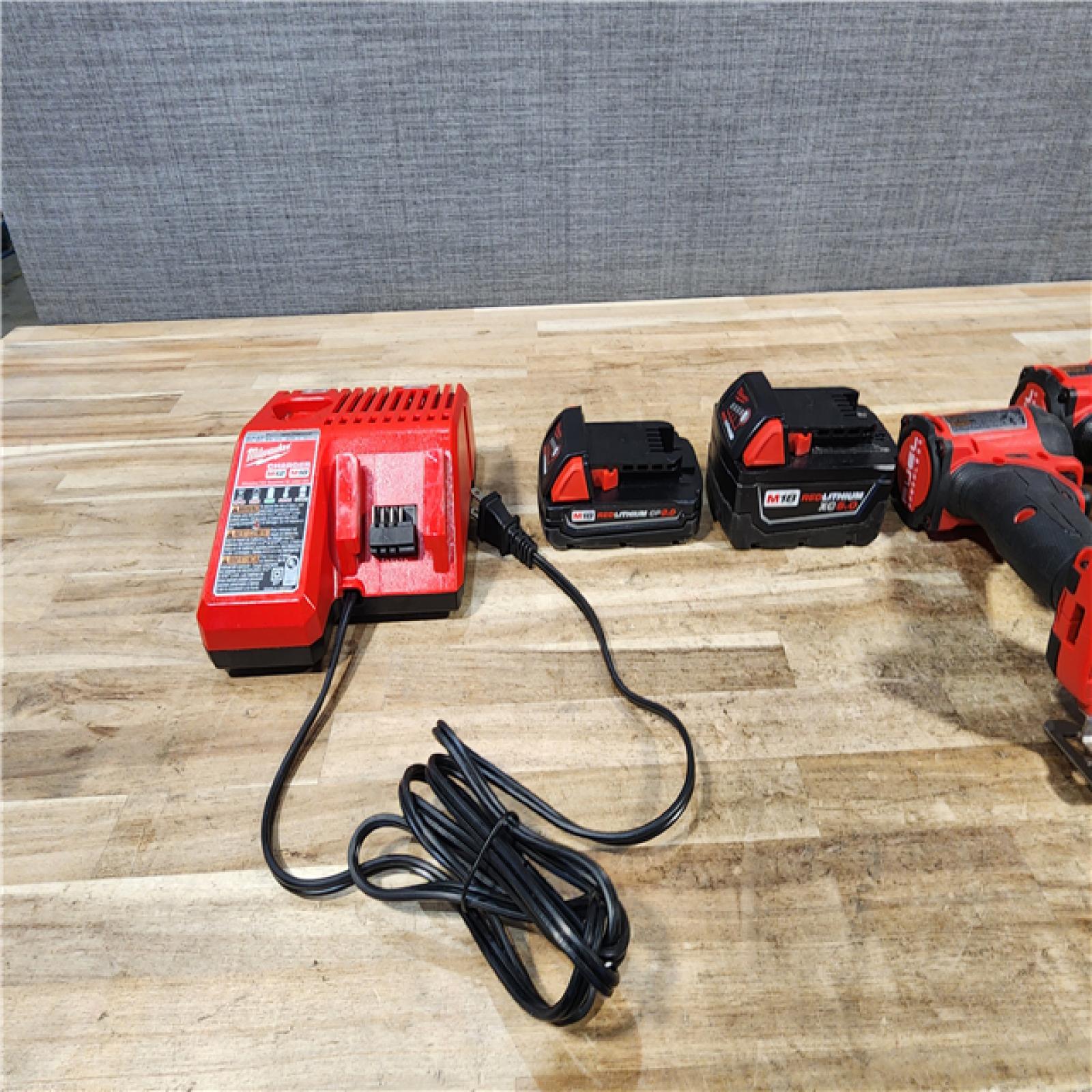 HOUSTON LOCATION - AS - IS Milwaukee 2 Tool Combo Kit W/ (2) Battery & Charger