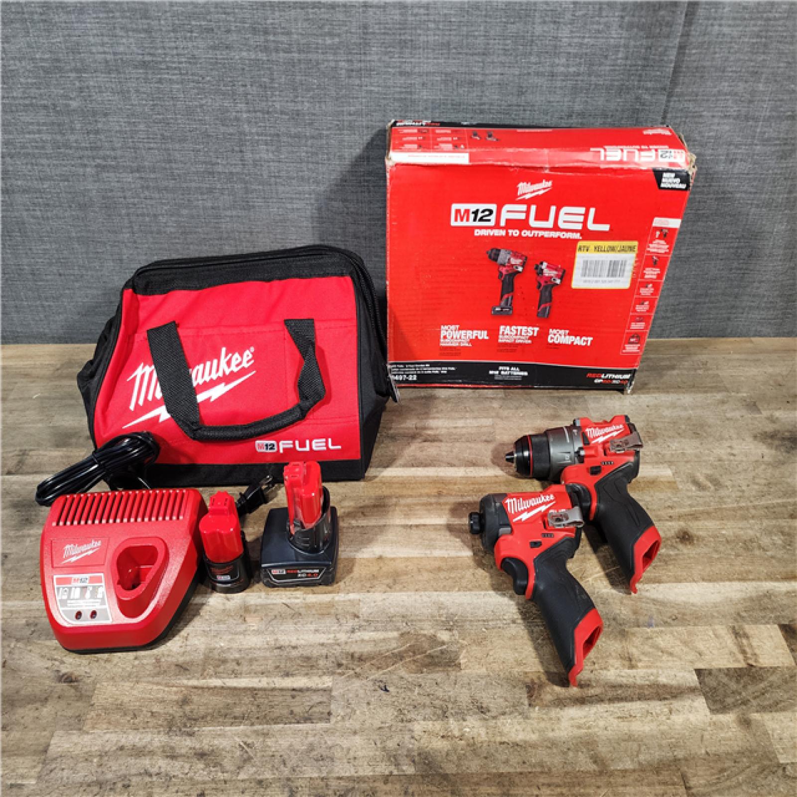 HOUSTON LOCATION - AS-IS Milwaukee FUEL 12-Volt Lithium-Ion Brushless Cordless Hammer Drill and Impact Driver Combo Kit