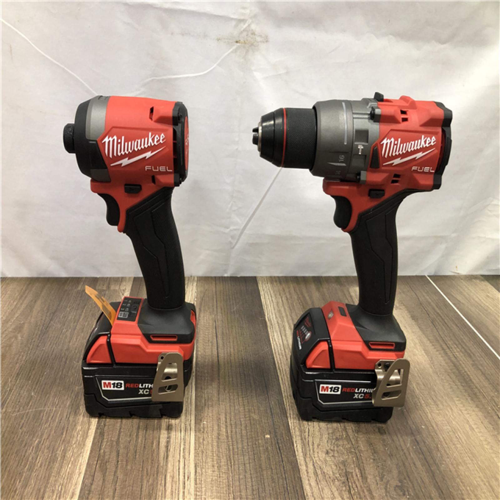 AS-IS Milwaukee  FUEL 18V Lithium-Ion Brushless Cordless Hammer Drill and Impact Driver Combo Kit