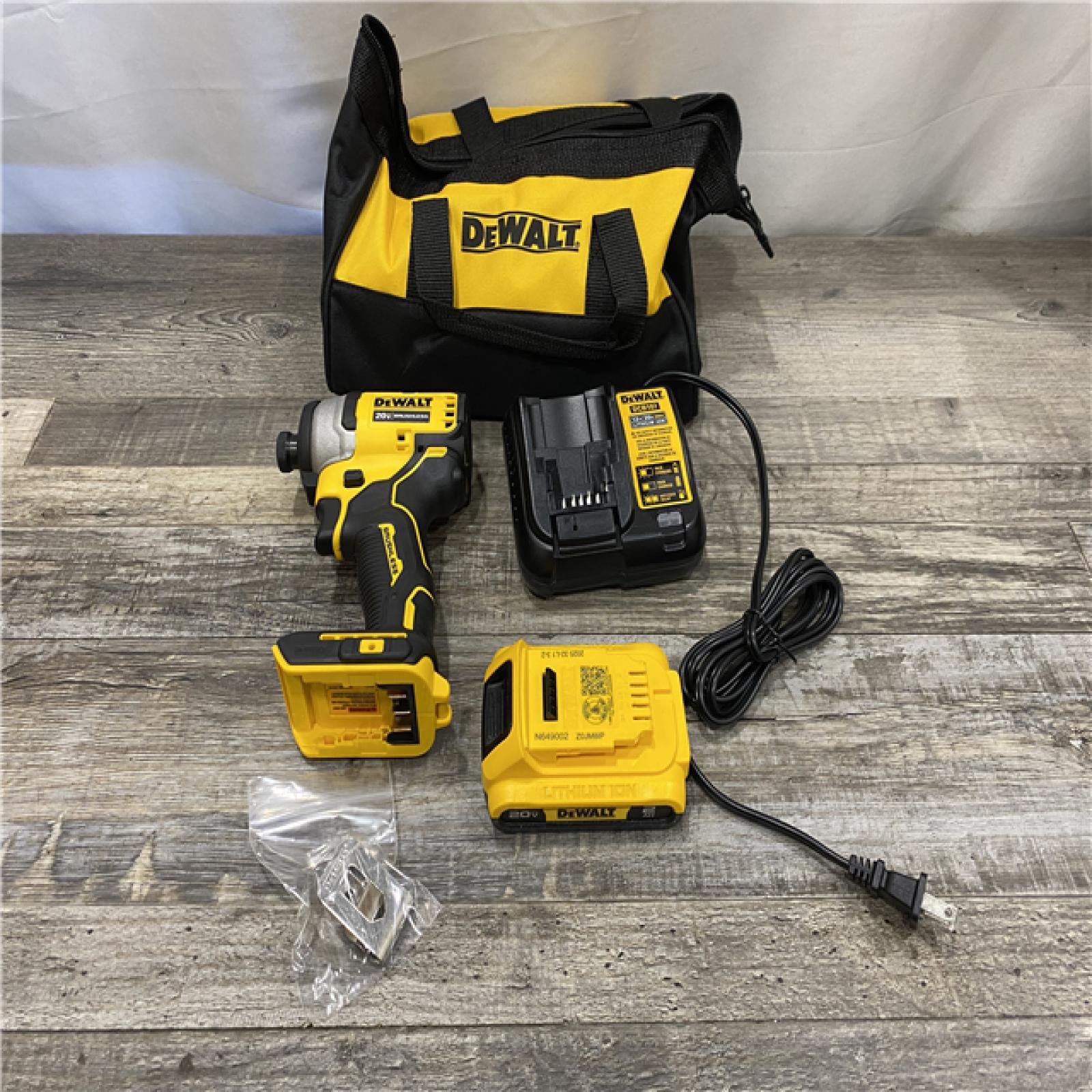 AS-IS DEWALT Atomic 20V Max Lithium-Ion Brushless Cordless Compact 1/4 in. Impact Driver Kit