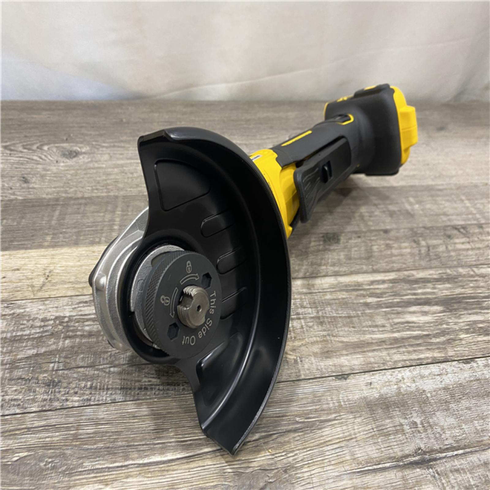 AS-IS DEWALT 20V MAX XR Cordless Brushless 4.5 in. Paddle Switch Small Angle Grinder with Kickback Brake (Tool Only)