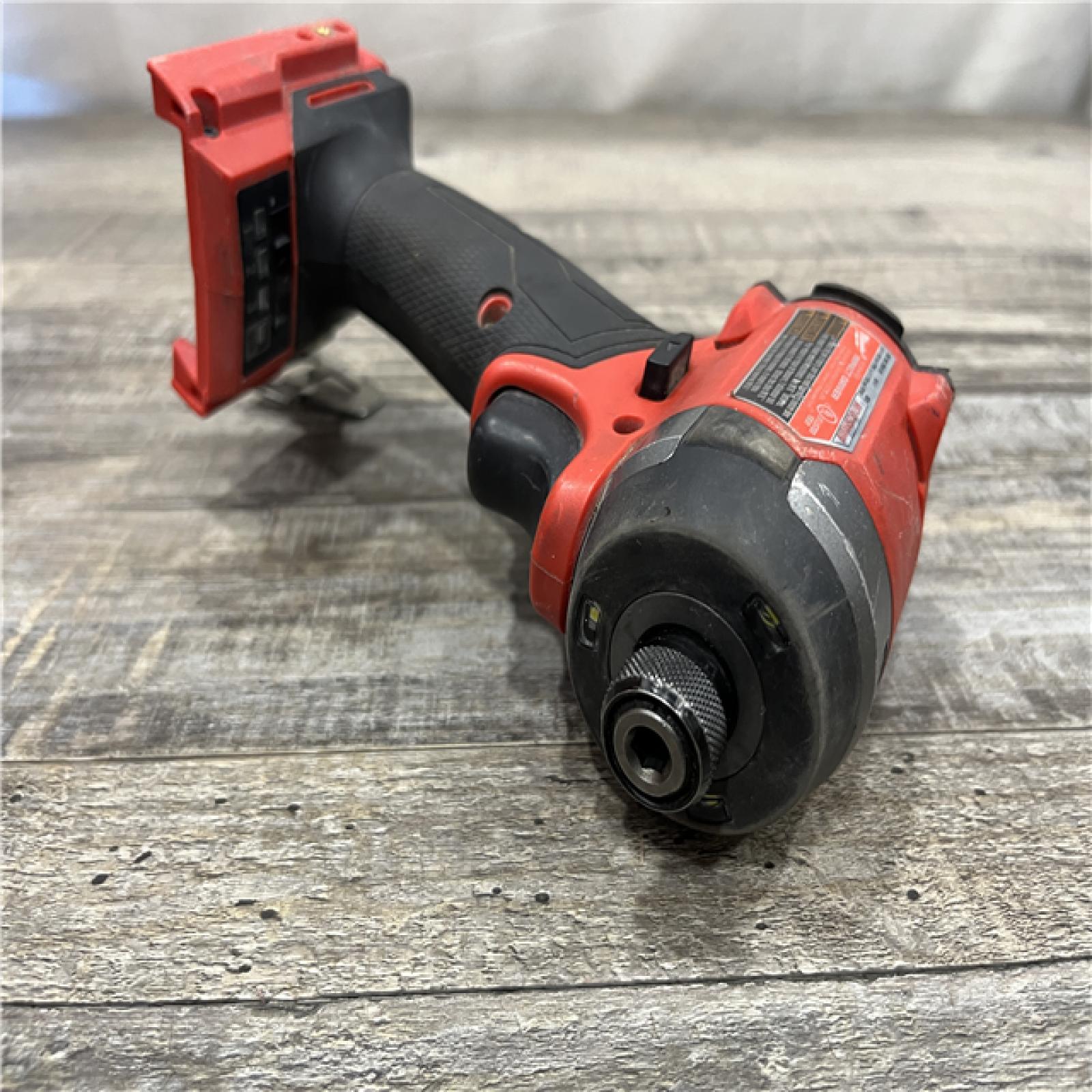 AS-IS Milwaukee FUEL 18V Lithium-Ion Brushless Cordless 1/4 in. Hex Impact Driver (Tool-Only)