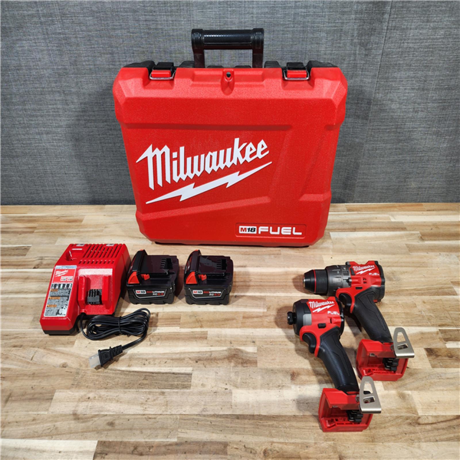 HOUSTON LOCATION - AS-IS (APPEARS LIKE NEW) Milwaukee  FUEL 18V Lithium-Ion Brushless Cordless Hammer Drill and Impact Driver Combo Kit