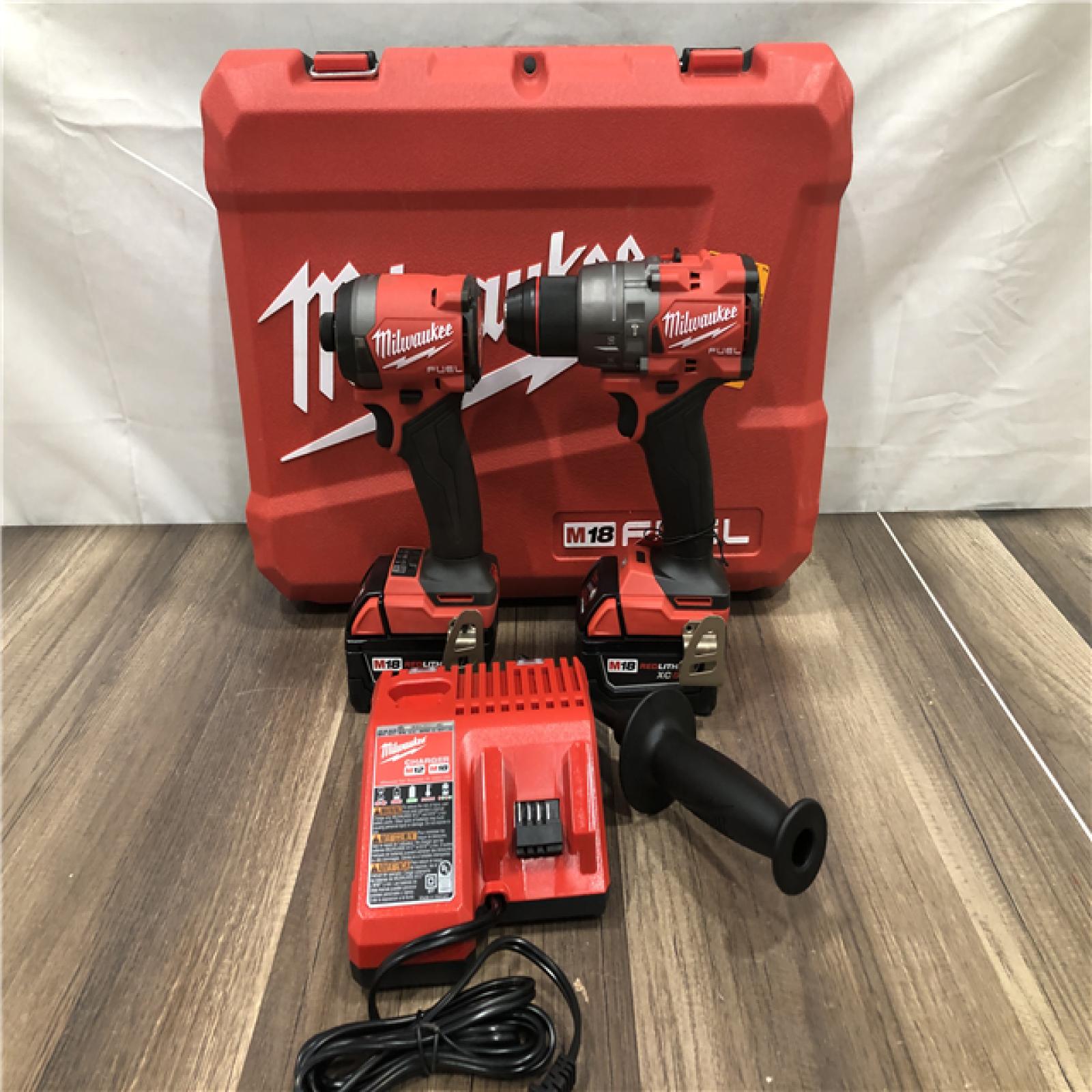 AS-IS Milwaukee FUEL 18V Lithium-Ion Brushless Cordless Hammer Drill and Impact Driver Combo Kit