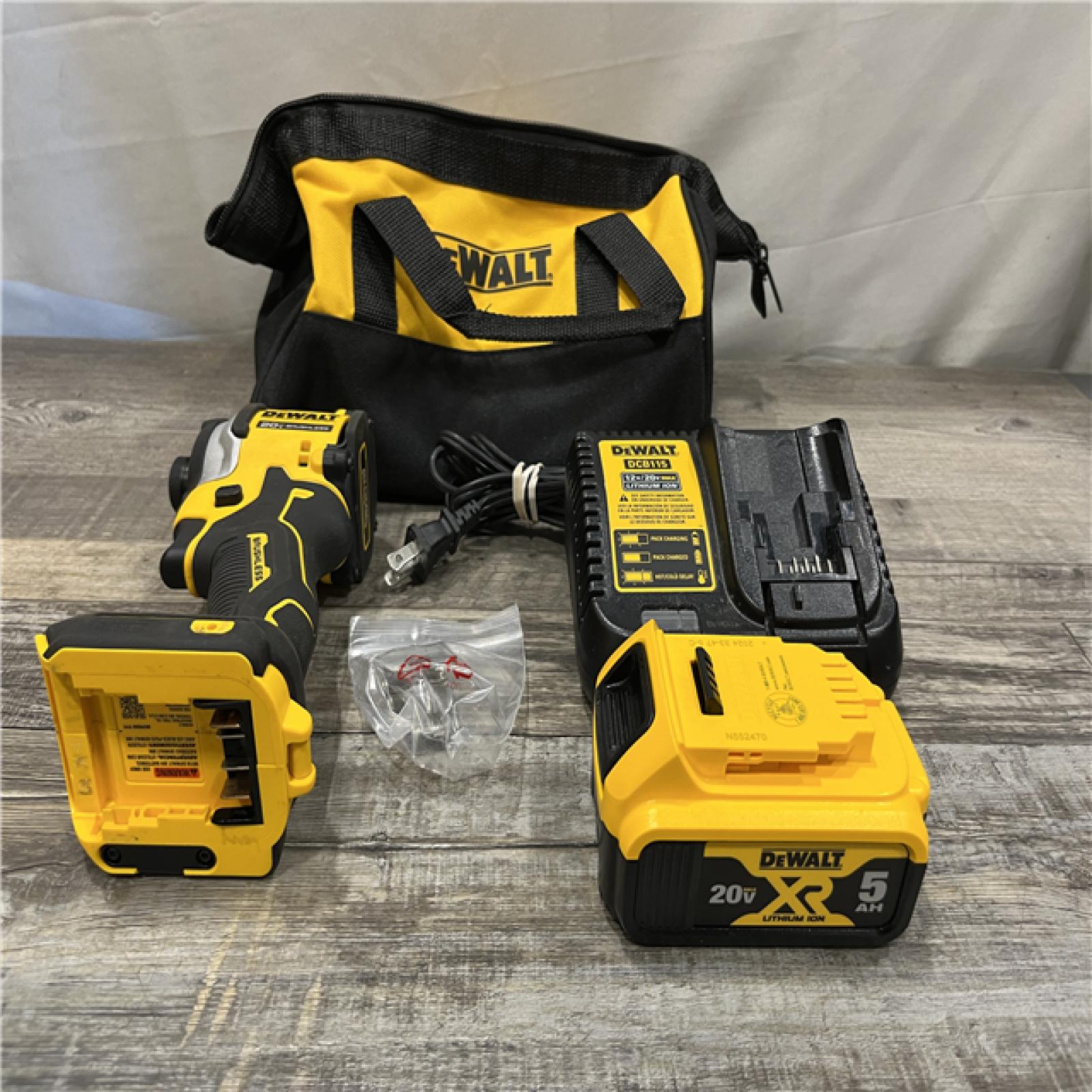 AS-IS DEWALT ATOMIC 20V MAX Lithium-Ion Cordless 1/4 in. Brushless Impact Driver Kit