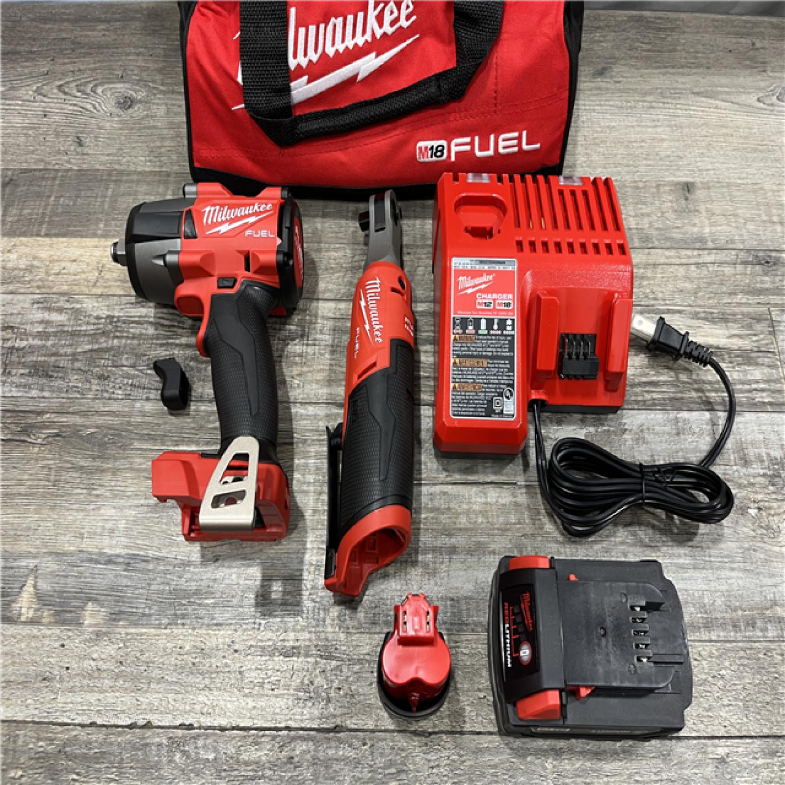 AS-IS Milwaukee FUEL 18V Cordless Mid Torque 1/2 in. Impact Wrench w/ 12 FUEL 3/8 in. Ratchet Combo Kit