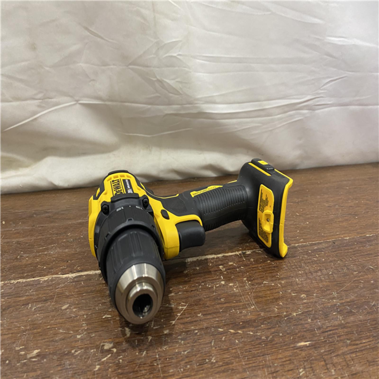 AS-IS ATOMIC 20V MAX Cordless Brushless Compact 1/2 in. Drill/Driver, (2) 20V 1.3Ah Batteries, Charger and Bag