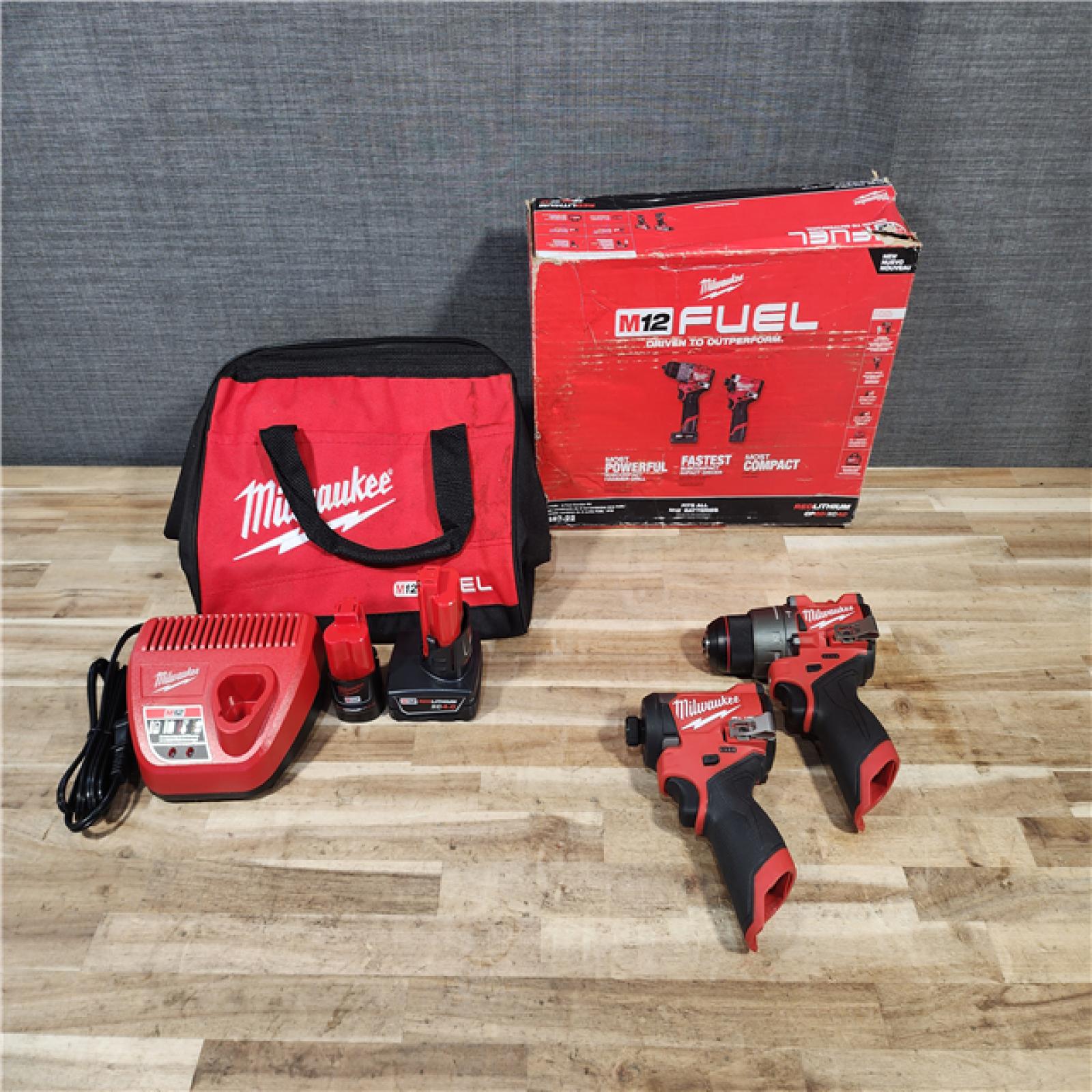 HOUSTON LOCATION - AS-IS Milwaukee  FUEL 12-Volt Lithium-Ion Brushless Cordless Hammer Drill and Impact Driver Combo Kit