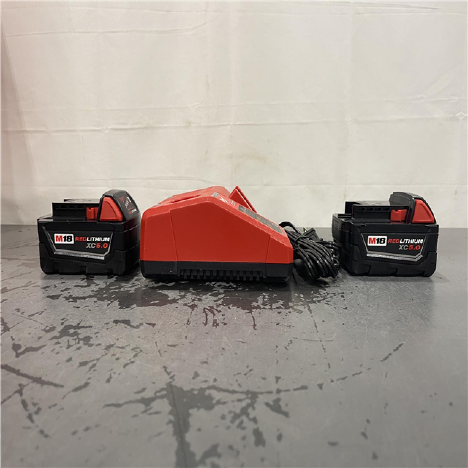 AS-IS- M18 18-Volt Lithium-Ion XC Starter Kit with Two 5.0Ah Batteries and Charger