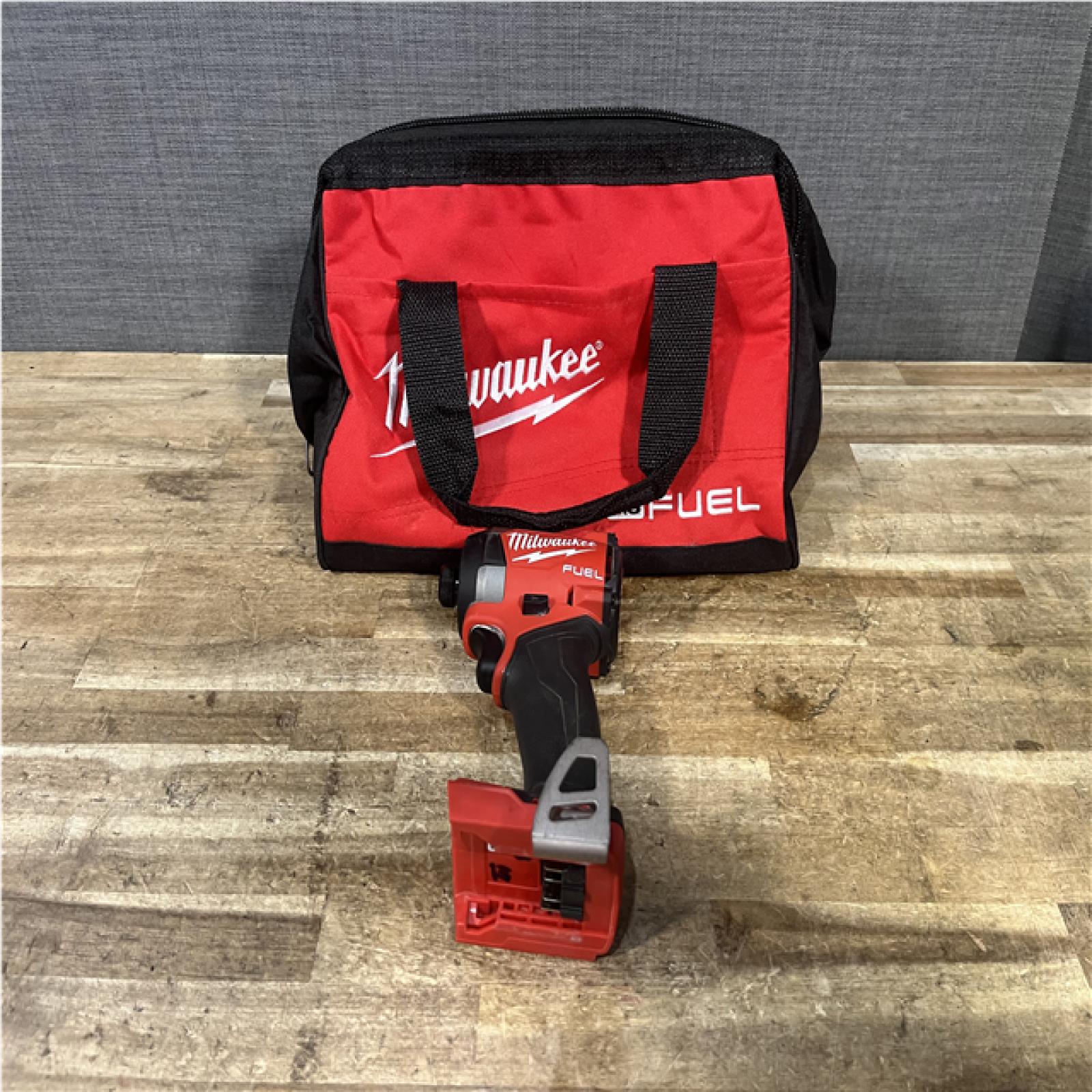 Houston Location AS-IS  Milwaukee FUEL 18V Lithium-Ion Brushless Cordless 1/4 in. Hex Impact Driver (Tool-Only)