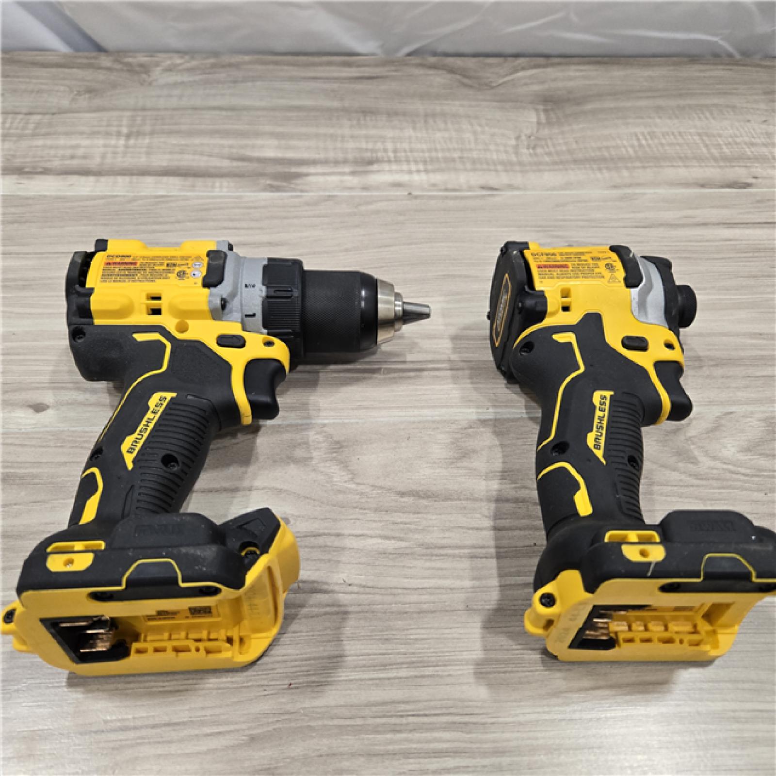 AS-IS DEWALT 20V MAX XR Cordless Drill/Driver, ATOMIC Impact Driver 2 Tool Combo Kit, (2) 2.0Ah Batteries, Charger, and Bag